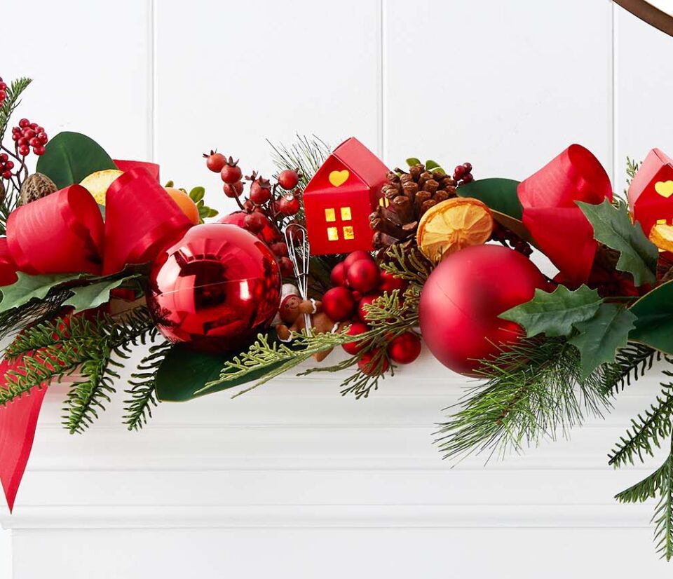 Christmas garland on fireplace mantel - Cadeaux Christmas Interior Decorating - Dallas TX